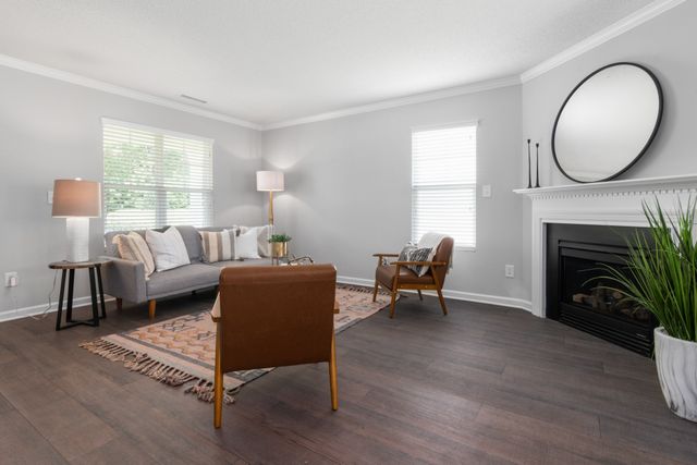 Bright and inviting modern living room with stylish furniture and decor.