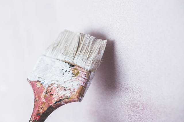 Brush painting white wall