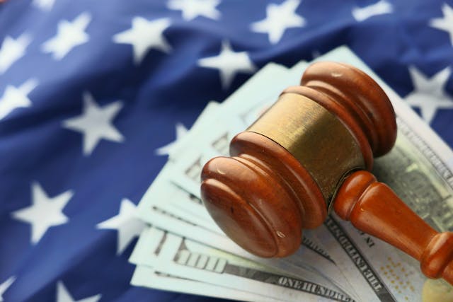 Judge Gavel Over Paper Bills