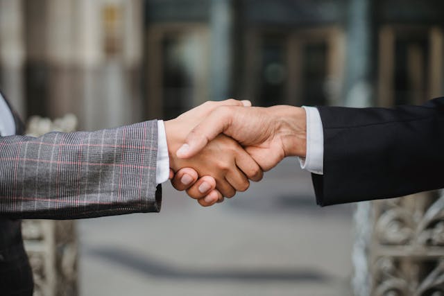 Two people shaking hands