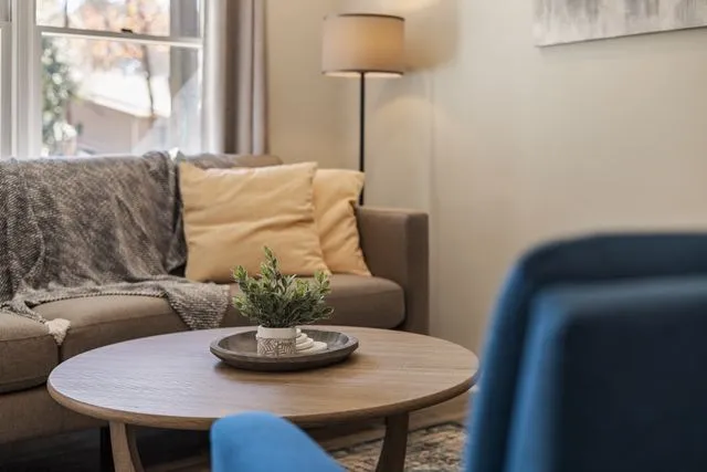 Family exploring potential new home guided by a real estate agent